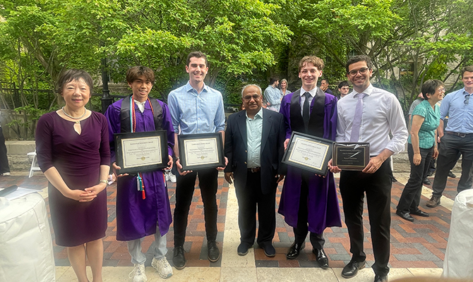 Professors Wei Chen (left) and Manohar Kulkarni (third from right) pose with Christopher Luey (second from left), Andy Wehmeyer (third from left), Kieran Cullen (second from right), and Youssef Abdelhalim (right).