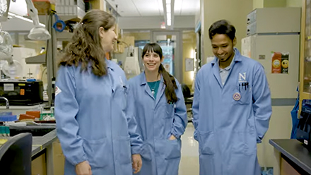 Student and professor touring a lab