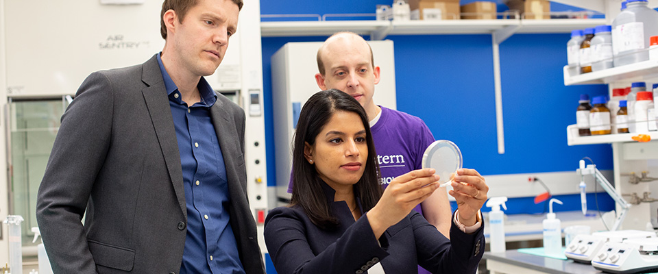 BME student inspecting lab equipment