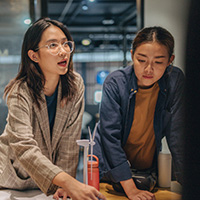 Two people in a meeting