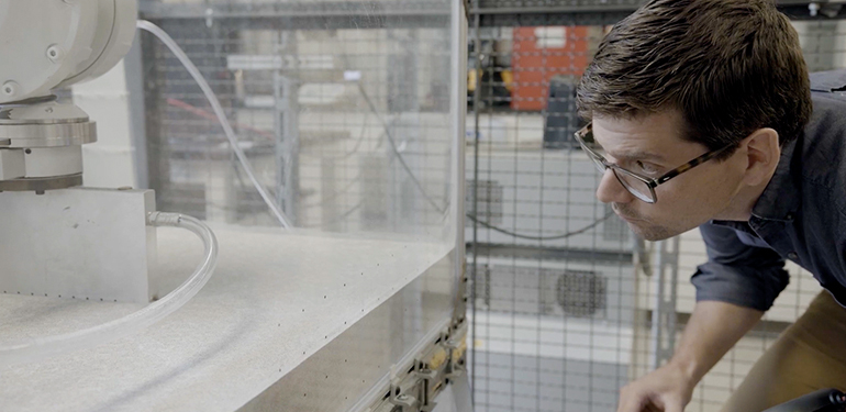 Student observing an experiment