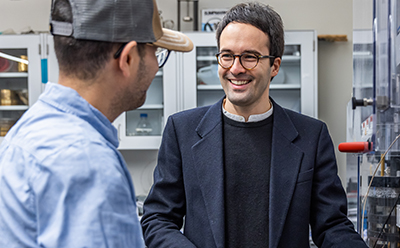 Professor speaking with student