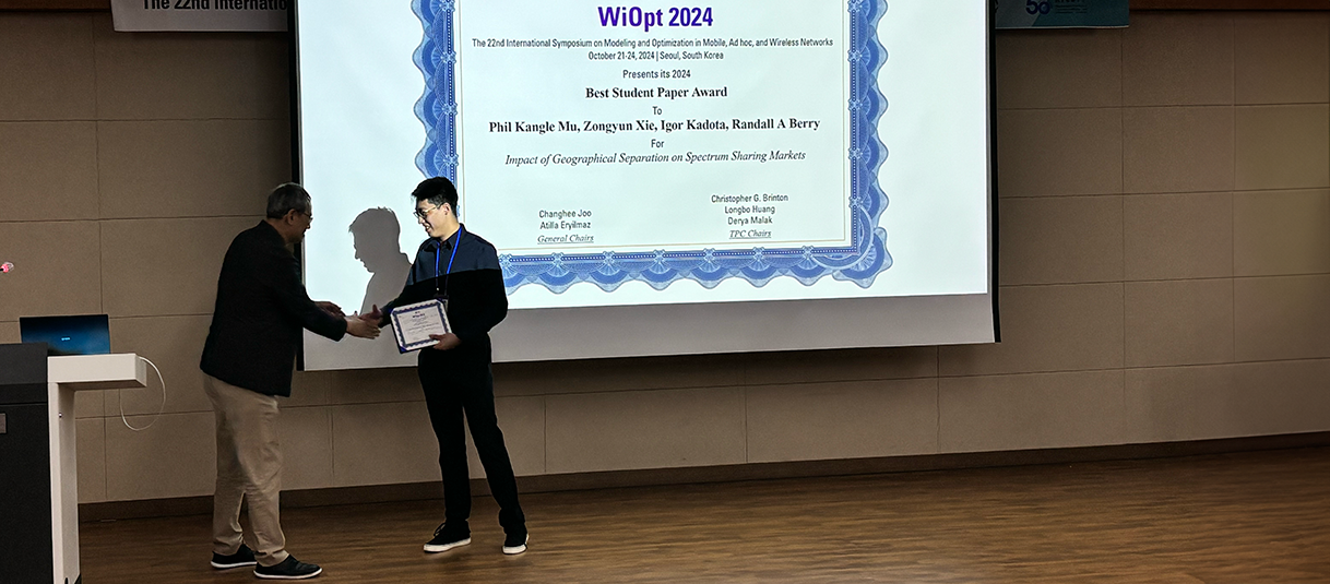 Kangle (Phil) Mu receives award at WiOpt 2024.