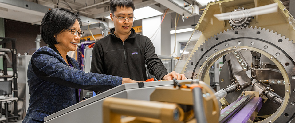 Professor and student in engineering lab