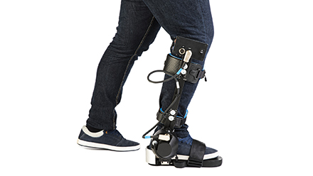 A robotic exoskeleton around a person's leg